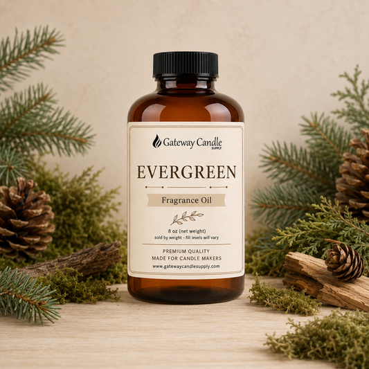 Evergreen fragrance oil bottle surrounded by ingredients representing its scent notes