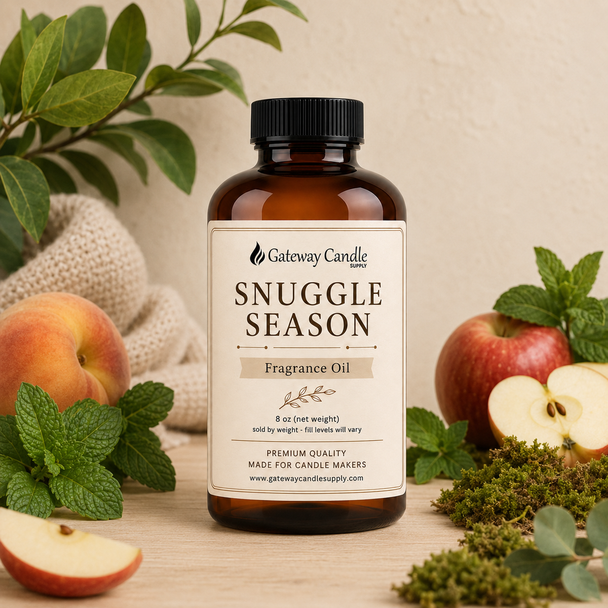 Snuggle Season fragrance oil bottle with apple, green leaves, mint, moss, wood and cozy knit fabric